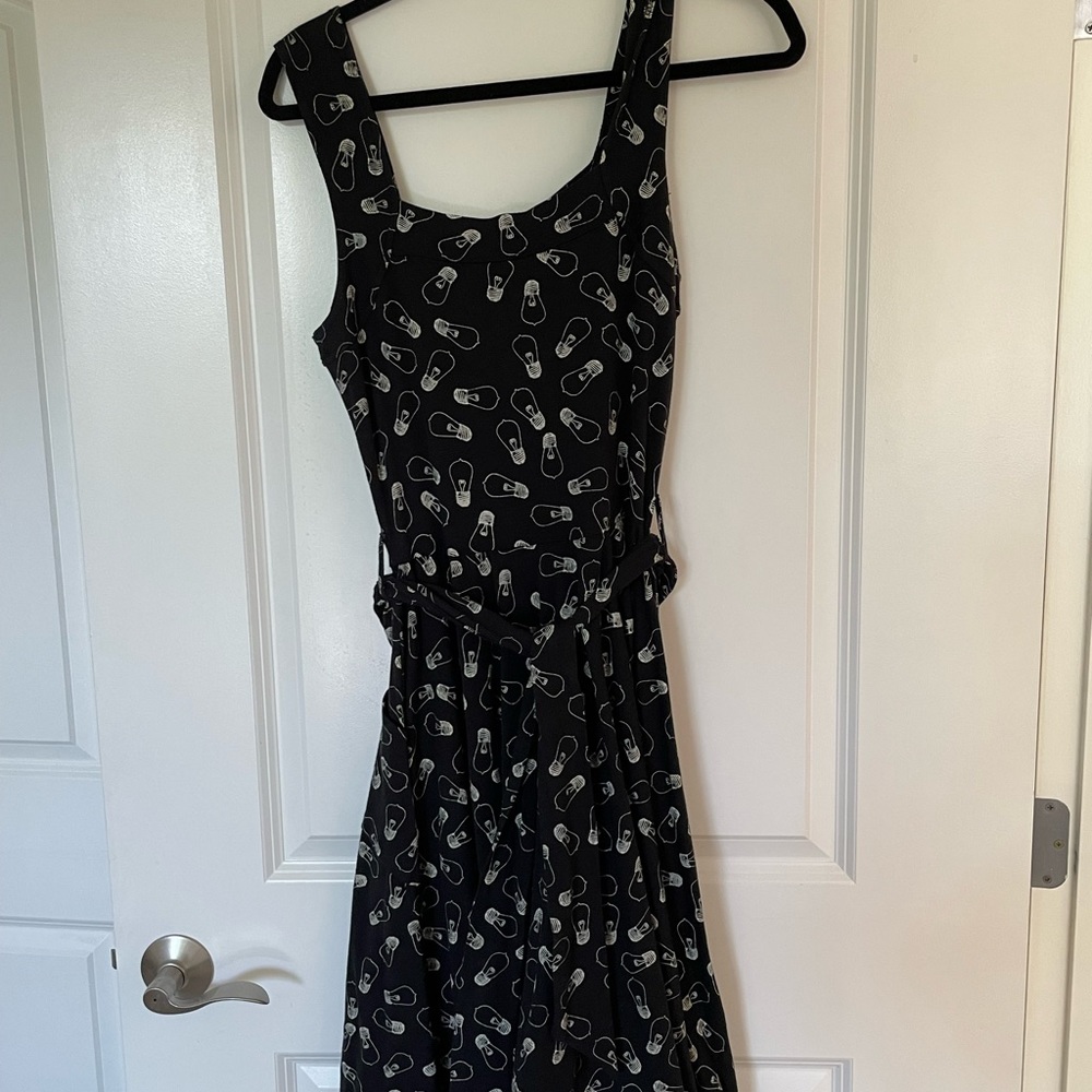 Beautiful black with light bulb midi dress.